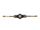 une broche-barre Art déco sertie de diamants et de saphirs