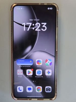a close up of a cell phone sitting on top of a table
