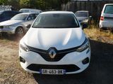 a white car that is parked in a lot