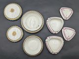 several pieces of porcelain are arranged in a circle on a table
