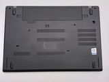 a black laptop that is sitting on a table