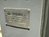 a metal plaque on the side of a building