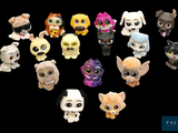 a lot of littlest pet shop toys on a black background