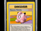 a close up of a pokemon card with a pink pig on it