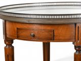 a small table with a mirror on top of it