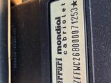 a close up of a car ' s dashboard with a sticker on it