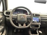 the interior of a car with a steering wheel, dashboard, and dash board