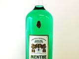 a bottle of alcohol that is sitting on a table