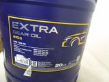 a blue barrel of extra gear oil sitting on a table