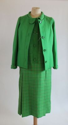 green jacket and skirt suit on a mannequin mannequin mannequin mannequin mannequin mannequin mannequin mannequin mann