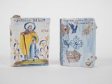 pair of ceramic figurines of saint anthony and saint john