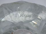 a close up of a glass of water with a label on it