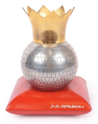 a shiny silver ball with a gold crown on top