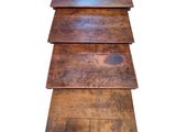 three wooden tables stacked on top of each other on a white background