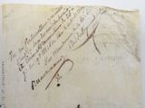 a piece of paper with writing on it on a table