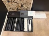 four different types of hair straightens in a box