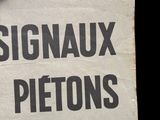 a sign that reads signaux pietons on a piece of paper