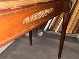 a table that has a lot of wood on it