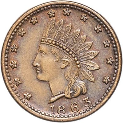 a close up of a coin with an indian head on it