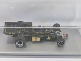a model of a racing car in a clear display case