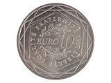 une image d'une pièce de monnaie sur laquelle figure un oiseau