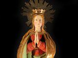an image of a statue of a woman with a crown on her head