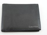 un portefeuille en cuir noir posé sur une table blanche
