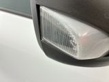 a close up of a car ' s side view mirror