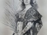 an old picture of a woman in a kimono with a fan