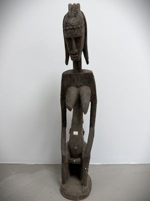 statue of a woman holding a baby in her arms
