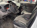 the interior of a small car with the door open