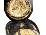 a wooden box that has a design on it