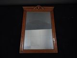 a mirror hanging on the wall in a room
