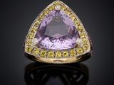 an amethorate and yellow sapphire ring set in 18k yellow gold