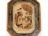 une assiette avec la photo d'une femme et d'un homme