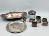 silver plate and silverware on a white background