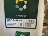 a white container with a green and yellow sign on it