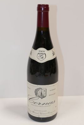 a bottle of wine that is sitting on a table