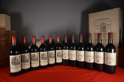 several bottles of red wine are lined up on a table
