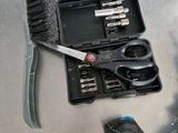 a pair of scissors and a brush on a table