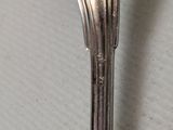 a spoon that is sitting on a table