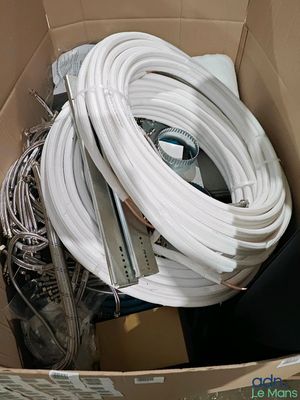 a cardboard box with a bunch of wires in it