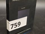 an image of a black book with a price tag on it