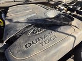 a close up of a car ' s engine with the hood open