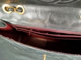 a purse that is open and has a handle on it