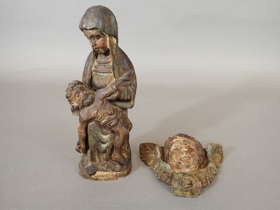 Lot comprenant une tête d'angelot ailé et une Piétà en bois …