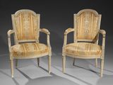 pair of louis xvi style armchairs with upholstered arms