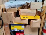 a pile of boxes sitting on a pallet in a warehouse