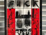 a picture of a poster on the wall of a building