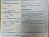 an image of a document with a picture of a person ' s name on it